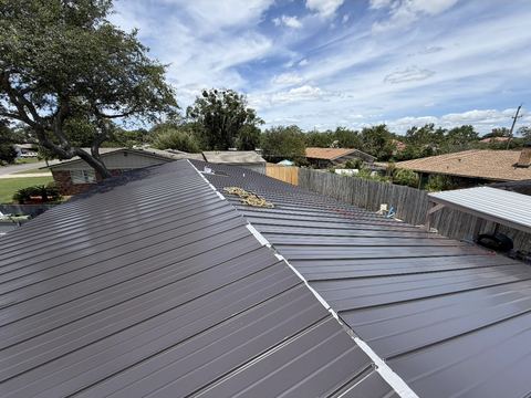 Metal panel roof installation