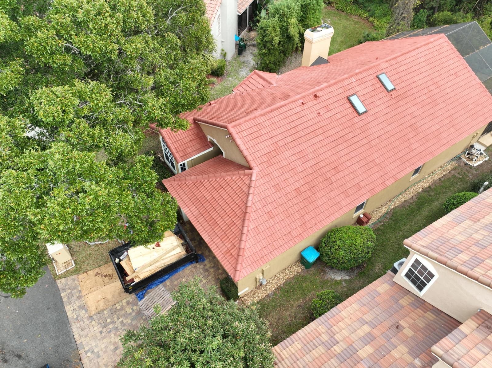 Aerial drone view of a completed barrel tile roof replacement by KLO Roofing